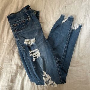ripped skinny mid rise jeans